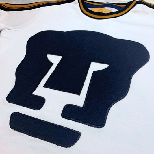 Pumas 76, Blanca.